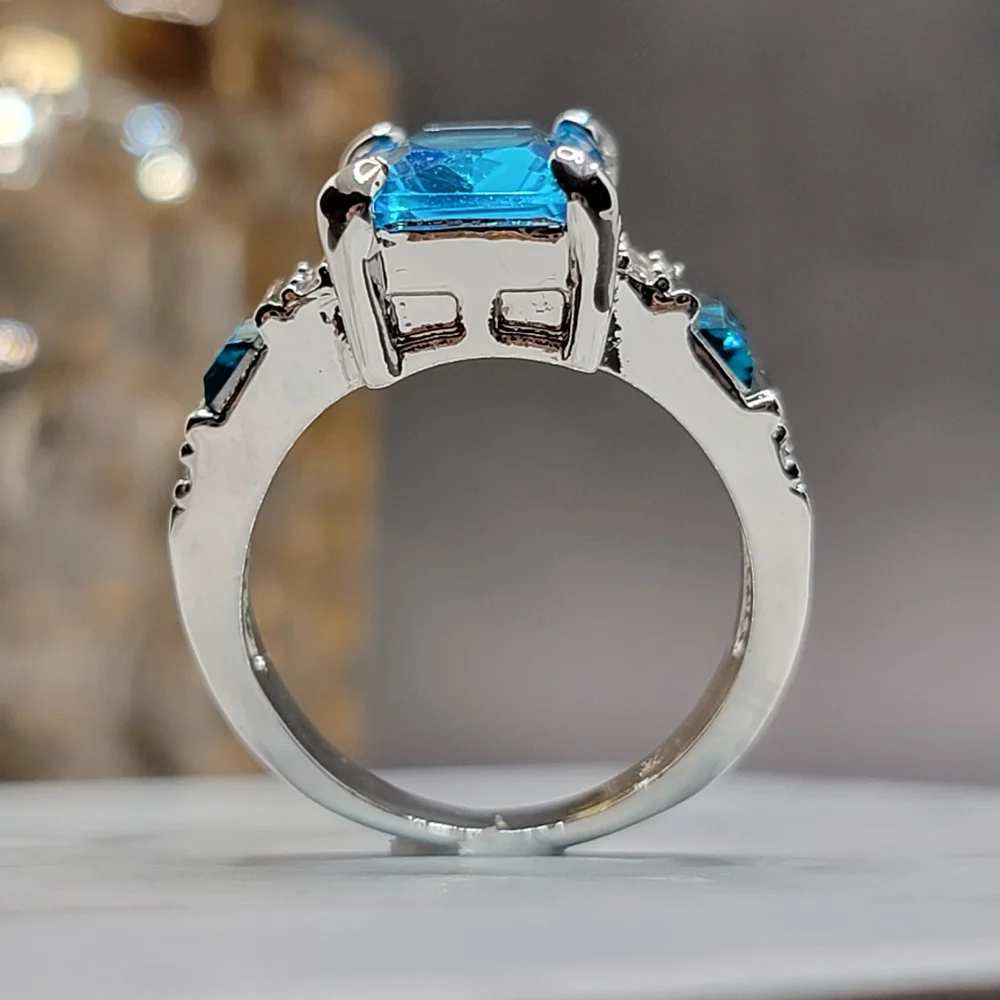 Silver Tone Simulated Blue Topaz Gemstone Ring